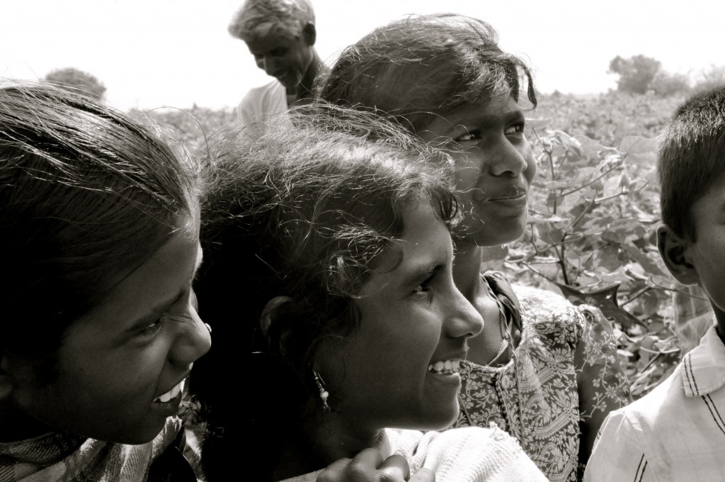child laborers in a cotton field